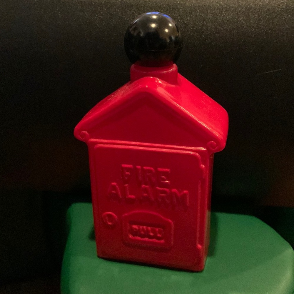 Avon vintage bottle, red fire alarm